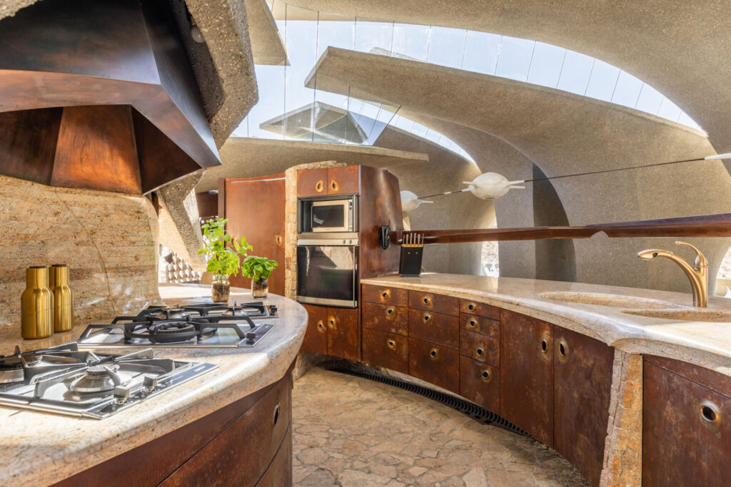 A curved kitchen provides the perfect space for entertaining